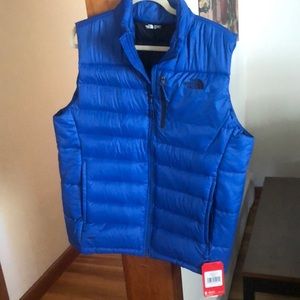 Blue North Face Vest, Brand New with Tags. Size Large.
